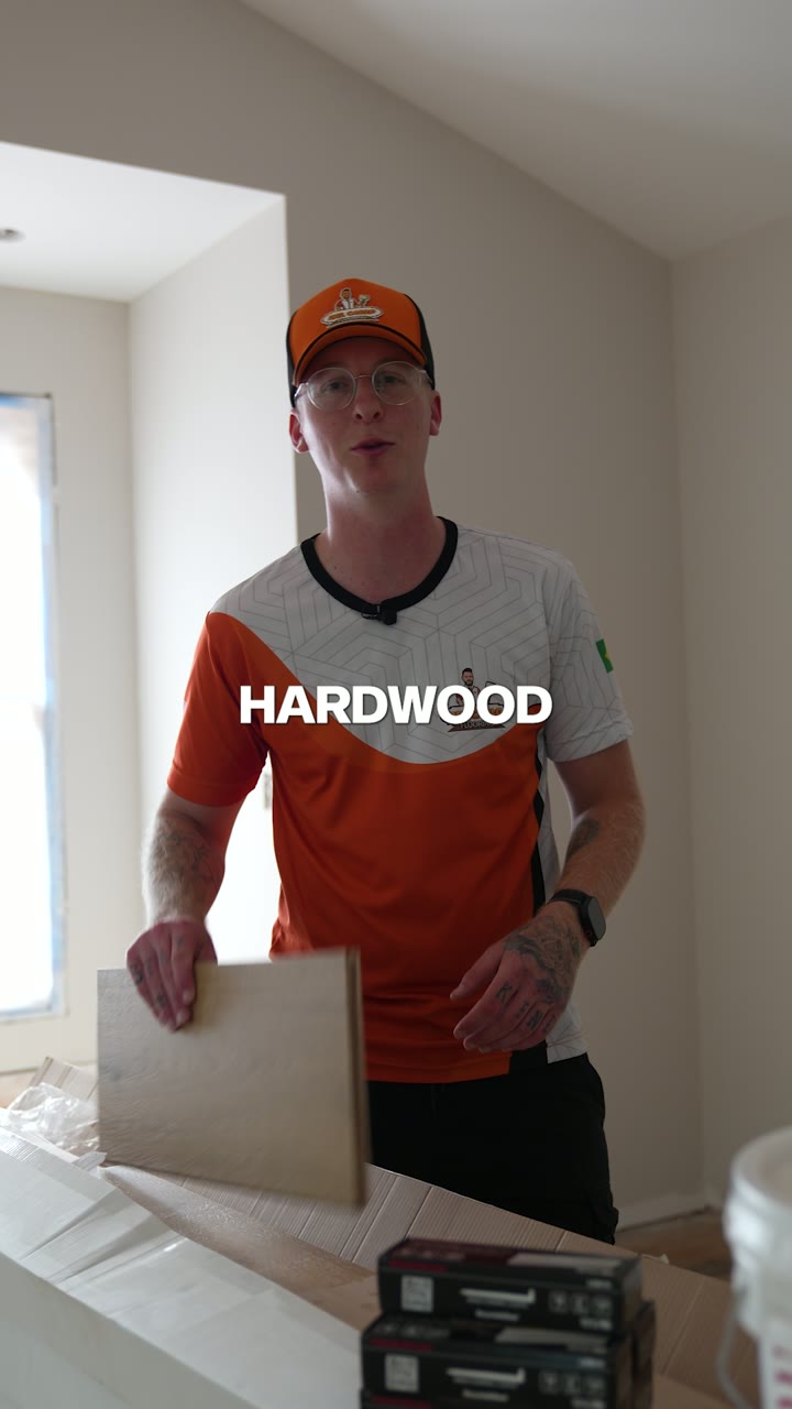 Del Carlo Flooring crew member presenting a hardwood installation